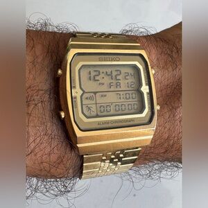 Seiko A714-5050 Running Man Gold Tone Digital LCD Alarm Chronograph Men's Watch